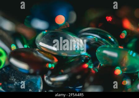 Background formed by a wall made of colored glass stones Stock Photo