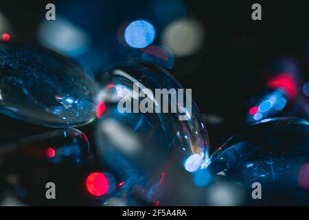 Background formed by a wall made of colored glass stones Stock Photo