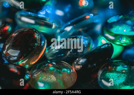 Background formed by a wall made of colored glass stones Stock Photo