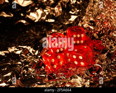 Red dices on grey background Stock Photo