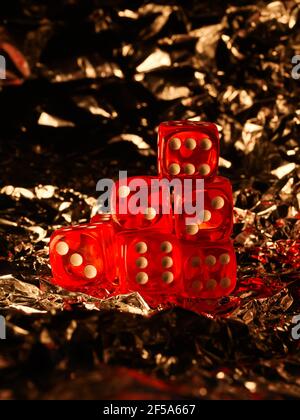 Red dices on grey background Stock Photo