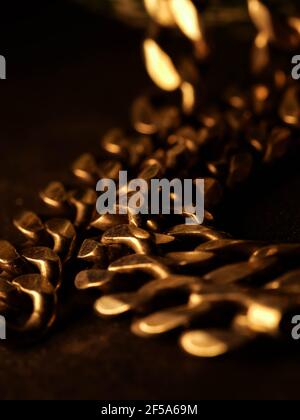 Cuban link silver chain on black background. Stock Photo