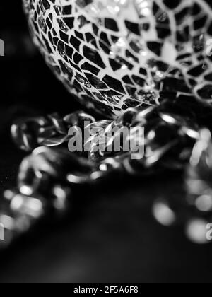 Cuban link silver chain on black background. Stock Photo