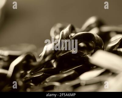 Cuban link silver chain on black background. Stock Photo