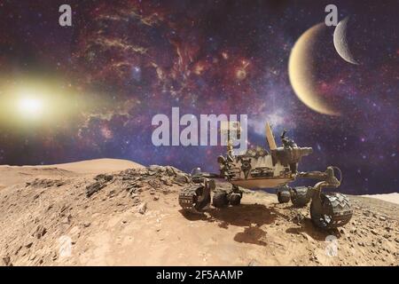 Curiosity Mars Rover exploring the surface of red planet. Elements of this image furnished by NASA. Stock Photo