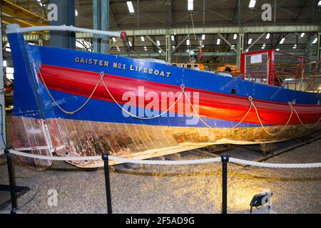 Old vintage historic Caister Lifeboat on display at Number Four Boat House / Boathouse Number 4 at Historic Dockyard / Dockyards Chatham in Kent. UK (121) Stock Photo
