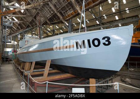 Coastal Motor Boat 103 – built for the Royal Navy in 1920, on display at Number 3 covered Slip 'The Big Space'  at Historic Dockyard, Chatham. Kent UK (121) Stock Photo