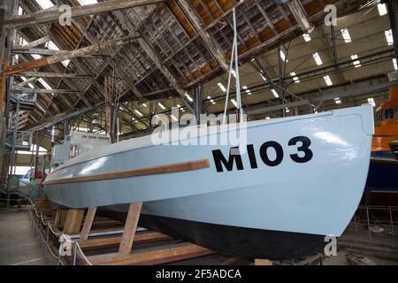 Coastal Motor Boat 103 – built for the Royal Navy in 1920, on display at Number 3 covered Slip 'The Big Space'  at Historic Dockyard, Chatham. Kent UK (121) Stock Photo