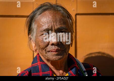Senior woman with traditional facial tattoo, Mindat, Myanmar Stock Photo