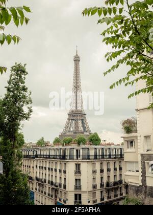 View towards Eiffel Tower from nearby street Stock Photo