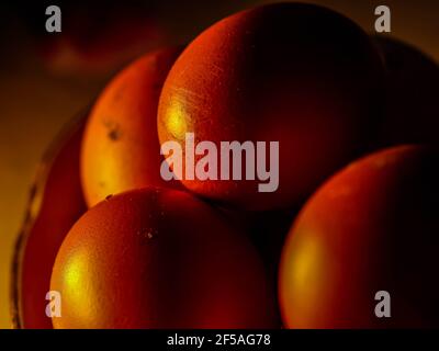 The chicken eggs in the panel are placed on a brown wooden background. Stock Photo