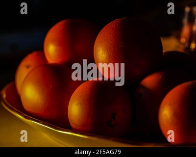 The chicken eggs in the panel are placed on a brown wooden background. Stock Photo