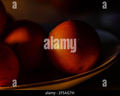 The chicken eggs in the panel are placed on a brown wooden background. Stock Photo
