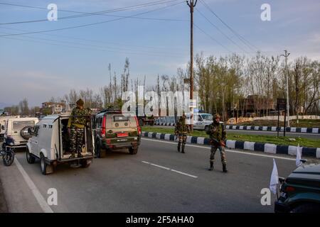 Indian army soldiers arrive at the site of an attack by suspected militants on the outskirts of Srinagar.Two Central Reserve Police Force (CRPF) personnel were killed and two others were injured in a suspected militant attack at Lawaypora on the outskirts of Srinagar city. Stock Photo