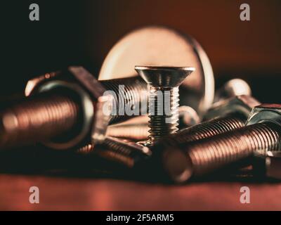 Close-up of various steel nuts and bolts Stock Photo
