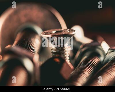 Close-up of various steel nuts and bolts Stock Photo