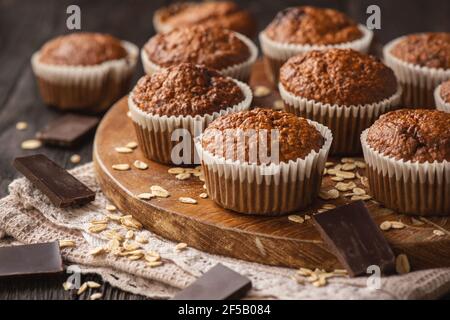 Homemade oat flakes muffins with peanut butter and chocolate. Stock Photo
