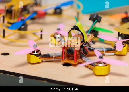 Various designs of mini drones for high-speed flights. Shooting video from a height Stock Photo