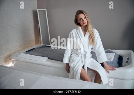 Pleased spa client posing for the camera Stock Photo
