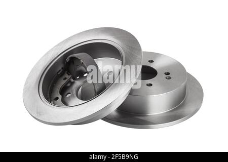 rear brake discs with drum brake pads inside a rotor, car spare parts side view isolated on white background. Stock Photo