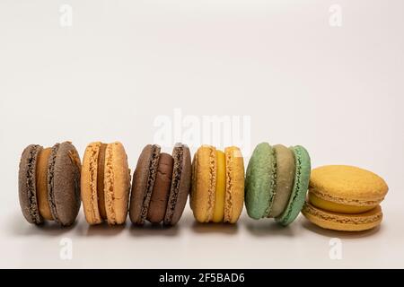 Sweet and colourful french macaroons or macaron on white background, Dessert. Stock Photo