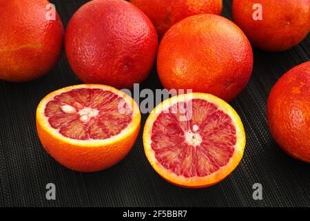 Blood oranges. Low key. Close up. Stock Photo