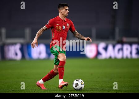 Turin, Italy - 24 March, 2021: Joao Cancelo of Portugal in action during the FIFA World Cup 2022 Qatar qualifying football match between Portugal and Azerbaijan. Portugal face Azerbaijan at a neutral venue in Turin behind closed doors to prevent the spread of Covid-19 variants. Portugal won 1-0 over Azerbaijan. Credit: Nicolò Campo/Alamy Live News Stock Photo