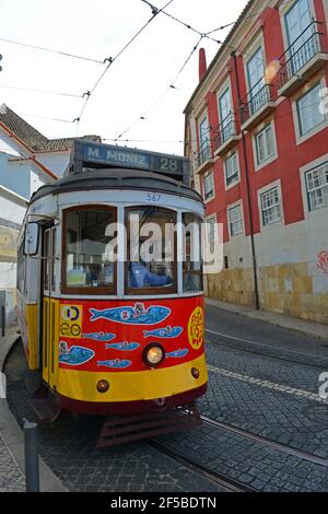 Antique Tram Route 28 at Largo Portas Sol station in Alfama district in city of Lisbon, Portugal. Stock Photo