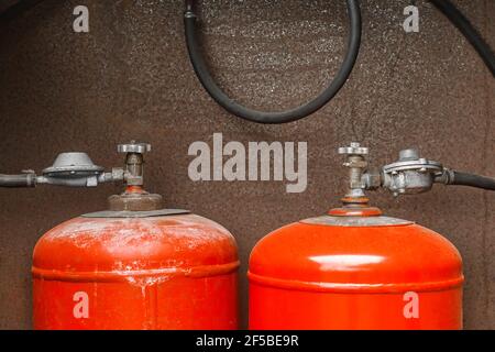 System for connecting two gas cylinders in the gas box of a residential building. Stock Photo