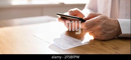 Remote Check Deposit Using Mobile Remote. Online Capture Stock Photo