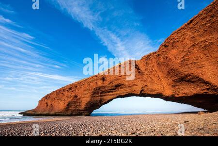 Natural phenomenon stone arch bridge of Legzira Beach, Atlantic ocean, Morocco