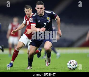 Scotland's John McGinn in action during the FIFA 2022 World Cup qualifying match at Hampden Park, Glasgow. Picture date: Thursday March 25, 2021. Stock Photo