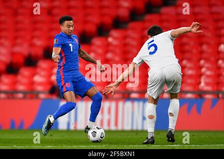 London, UK. 25th Mar, 2021. Jesse Lingard (England #7) and Brolli Cristian (San Marino #5) battle for the ball during the World Cup 2022 Qualification match between England and San Marino at Wembley Stadium in London, England. Credit: SPP Sport Press Photo. /Alamy Live News Stock Photo