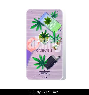 human hand holding cup of tea with medical cannabis leaves drugs consumption marijuana products at wooden background smartphone screen mobile app top Stock Vector