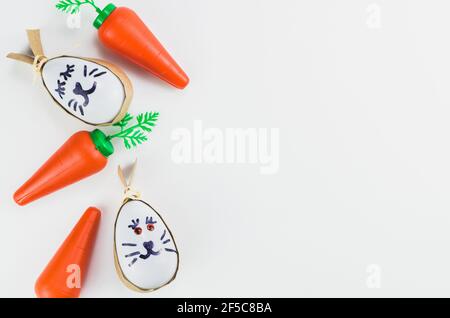 Colorful Easter eggs and other objects on a trendy white background for various Easter themed backgrounds Stock Photo
