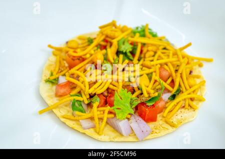 Masala Papad with Kerala mixture on top Stock Photo