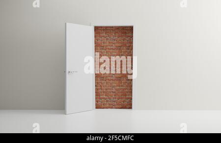 Door open to reveal red brick wall blocking the way in a modern room Stock Photo
