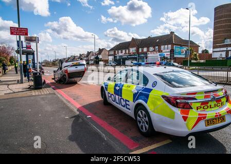 Police at the scene of an overturned car at a bus stop, a Citroen, on A34 Walsall Road, Great Barr, Birmingham, UK Stock Photo