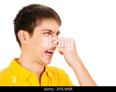 Young Man feel a Stink Isolated on the White Background Stock Photo