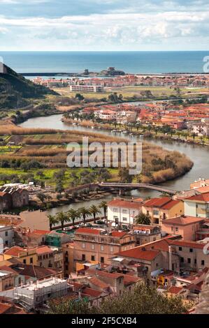 cityscape of the beautiful village of Bosa with colored houses and a medieval castle Stock Photo