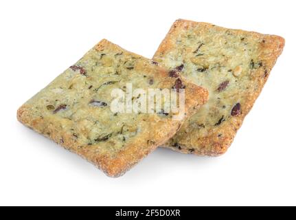Dry crackers isolated on white background. Cracker cookies with herbs top view Stock Photo
