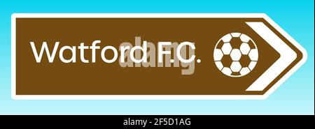 Watford, United Kingdom - May 08 2020:  A graphic illlustration of a British tourist road sign pointing to the home ground of Watford FC Stock Photo