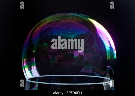 soap bubble on rim of a glass Stock Photo
