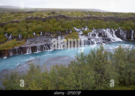 Hraunfossar waterfalls pour into Hvita, between Husafell and Reykholt, Iceland, Hallmundarhraun Stock Photo