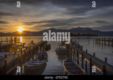 sunrise over the Alps at lake Chiemsee on New Years morning, Germany, Bavaria, Lake Chiemsee Stock Photo