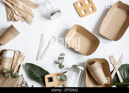 Disposable environmentally friendly tableware. Eco friendly disposable tableware. The concept of saving the planet, the rejection of plastic. Stock Photo