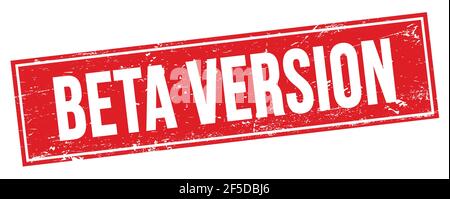 BETA VERSION text on red grungy rectangle stamp sign. Stock Photo