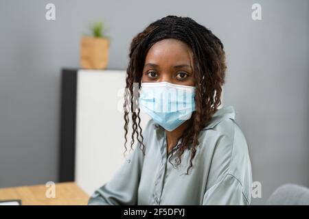 African American Business Woman Wearing Face Mask Stock Photo