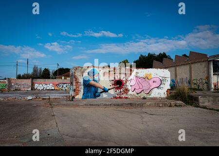 Vila Nova De Gaia, Portugal. 13th Nov, 2020. A graffiti by Mr. Dheo, a famous Portuguese street artist, painted in an abandoned factory in Arcozelo, Vila Nova de Gaia. It is called 'Anjos na terra' which means 'Angels on earth' paying tribute to all the nurses helping fight COVID-19. Portrayed here is Nurse Sofia who got COVID 19 in march 2020 but got back helping fight COVID 19 again. (Photo by Teresa Nunes/SOPA Images/Sipa USA) Credit: Sipa USA/Alamy Live News Stock Photo