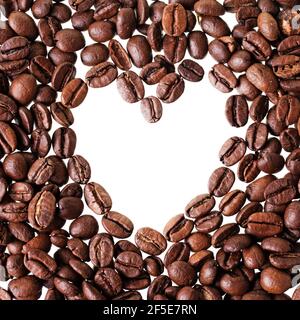 Heart made from coffee beans isolated on a white background. Stock Photo